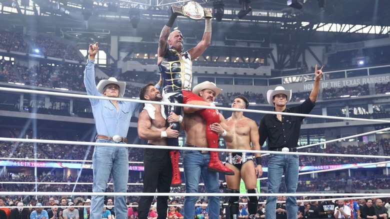 Dustin Rhodes celebrates his TNT title win