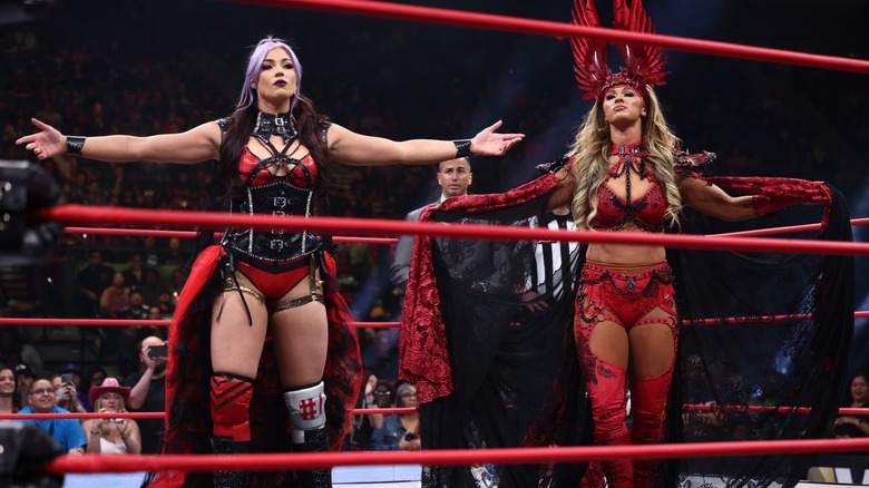 Divine Dominion pose in the ring