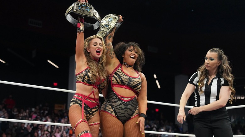Babes of Wrath hold up their titles