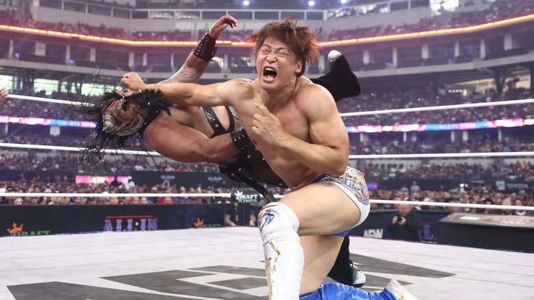 Kota Ibushi takes Beast Mortos down with a lariat