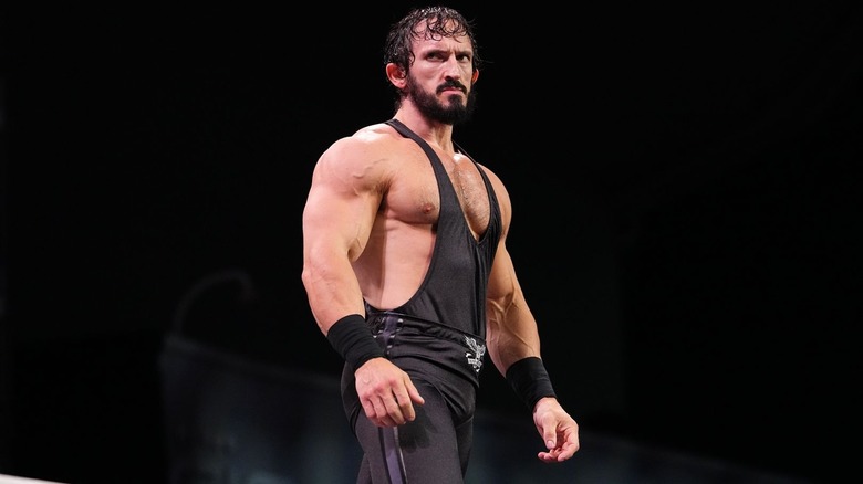 PAC walking to the ring
