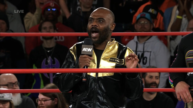 Stokley Hathaway speaks on the microphone.