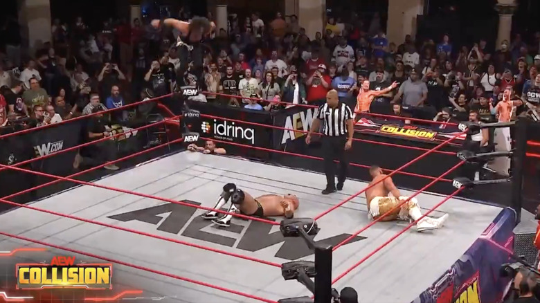 The Bang Bang Gang and Harwood in the ring
