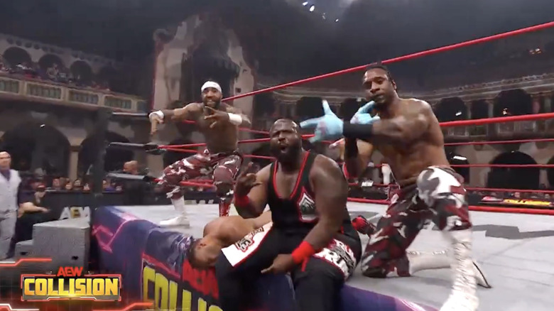 Shane Taylor Promotions posing next to Darius