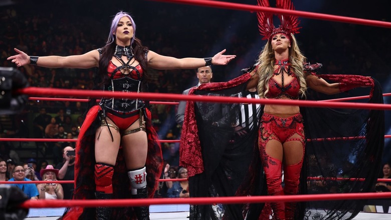 Divine Dominion pose in the ring