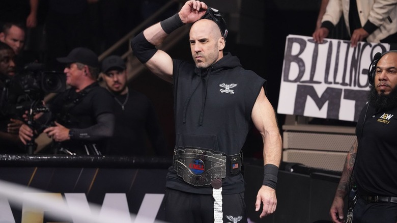 Claudio Castagnoli with the CMLL World Heavyweight title