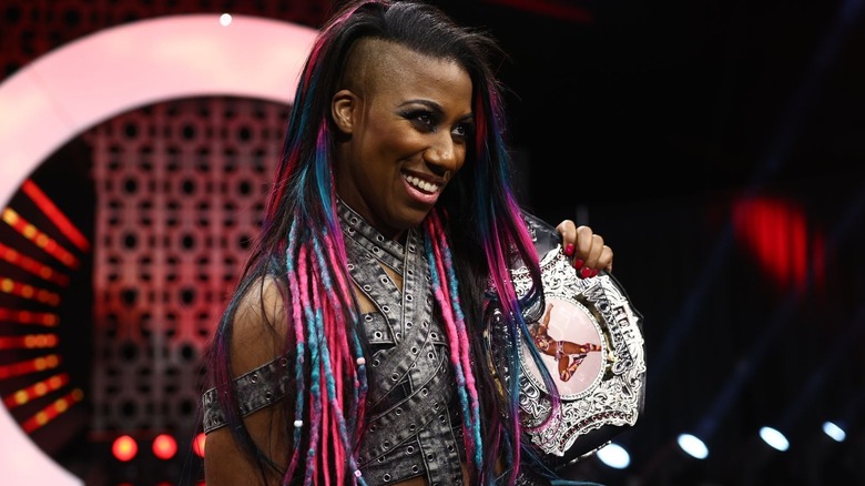 Athena posing with the ROH Women's Championship
