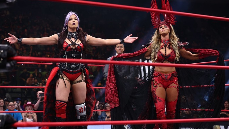 Divine Dominion pose in the ring