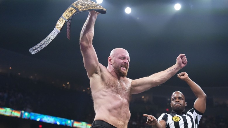 Jon Moxley with the title in the air