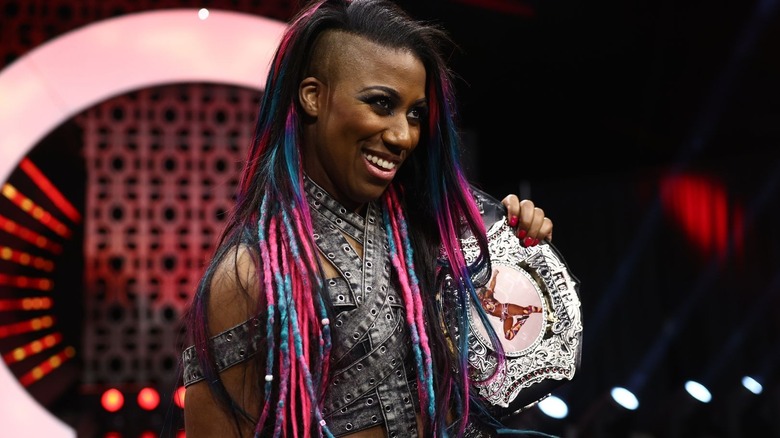 Athena posing with the ROH Women's Championship