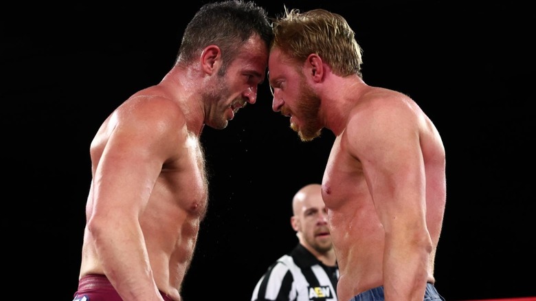 Roderick Strong and Orange Cassidy staring at each other