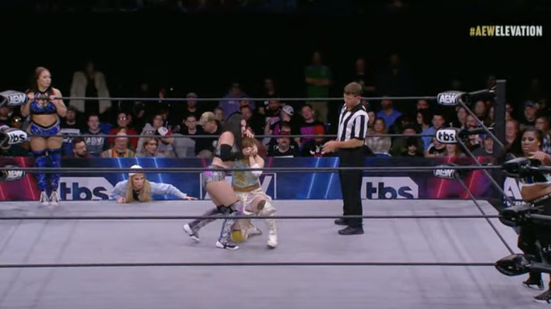Diamante and Sakazaki locking up