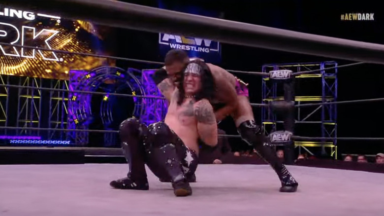 Moriarty with a hold applied to Morales