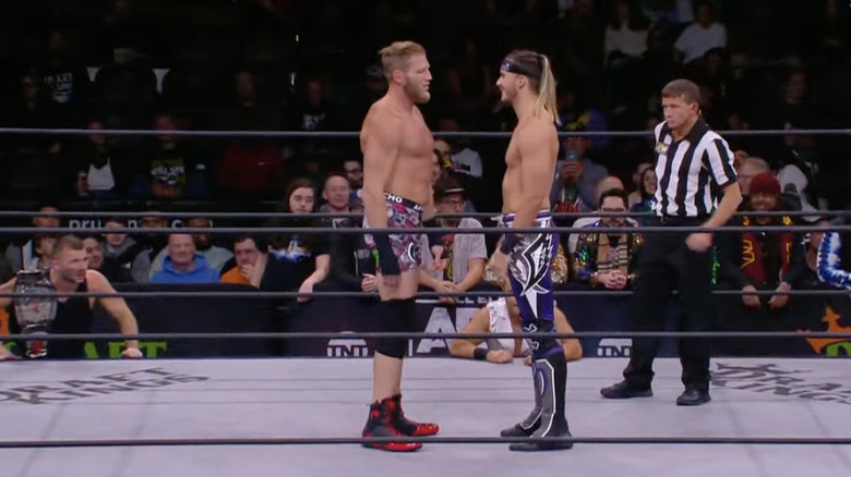 The two men facing off in the ring