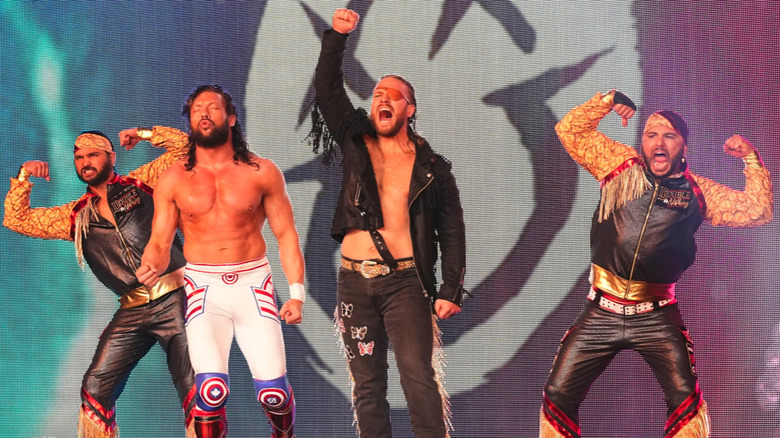 The Elite pose on stage at AEW Double or Nothing 2023