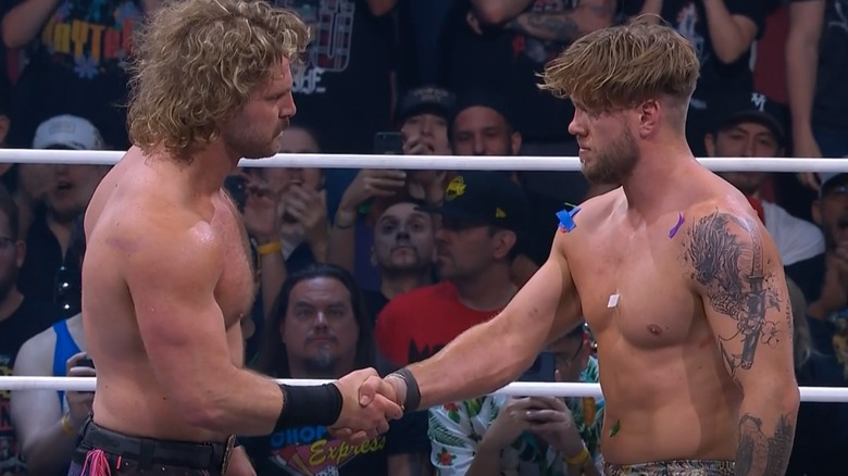 "Hangman" Adam Page and Will Ospreay shake hands