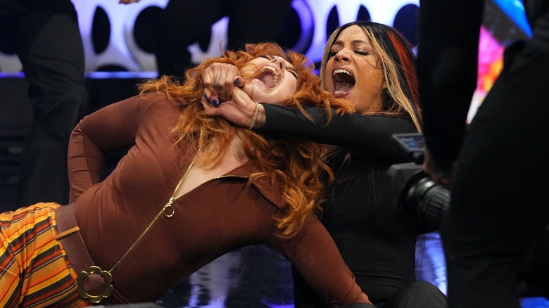 Mercedes Mone locks in a hold on Jamie Hayter