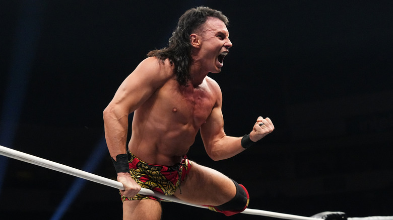 "Speedball" Mike Bailey poses on the ropes while looking to Continental Champion Kazuchika Okada during an episode of "AEW Collision."