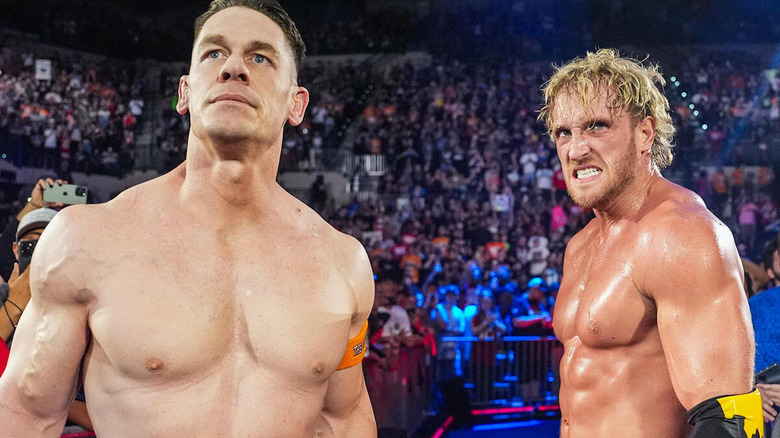 John Cena standing with Logan Paul at 