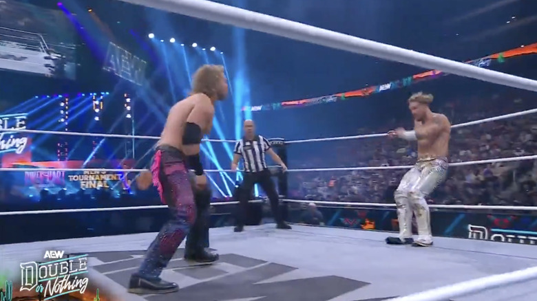 Ospreay and Page in the ring