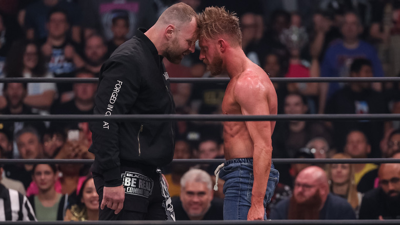 Jon Moxley nose to nose with Orange Cassidy