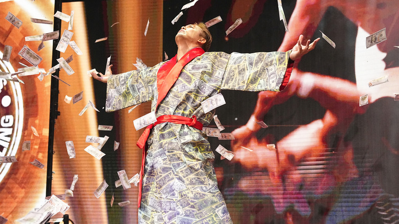 Kazuchika Okada with arms wide