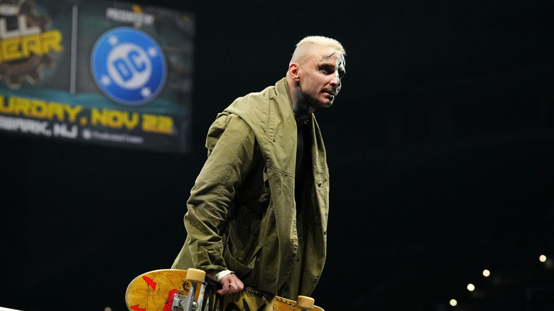 Darby Allin stands on the turnbuckle
