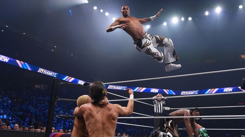 Isaiah Kassidy leaps at Matt Jackson and Myron Reed