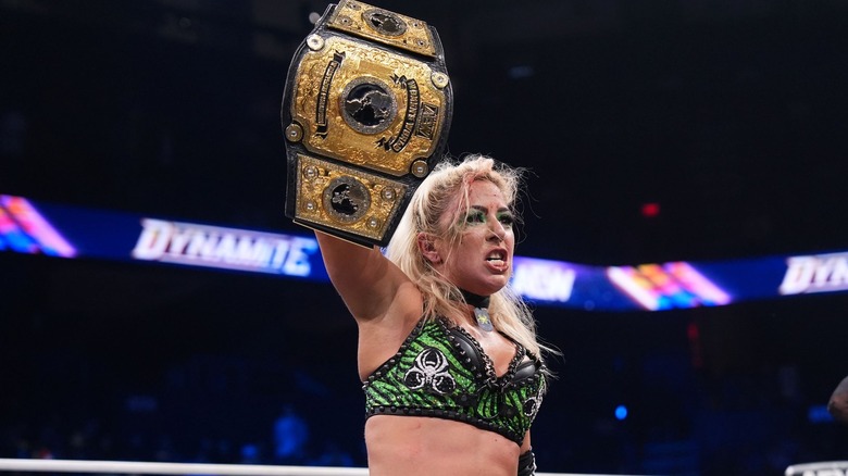 Thekla celebrates with the AEW Women's World Title