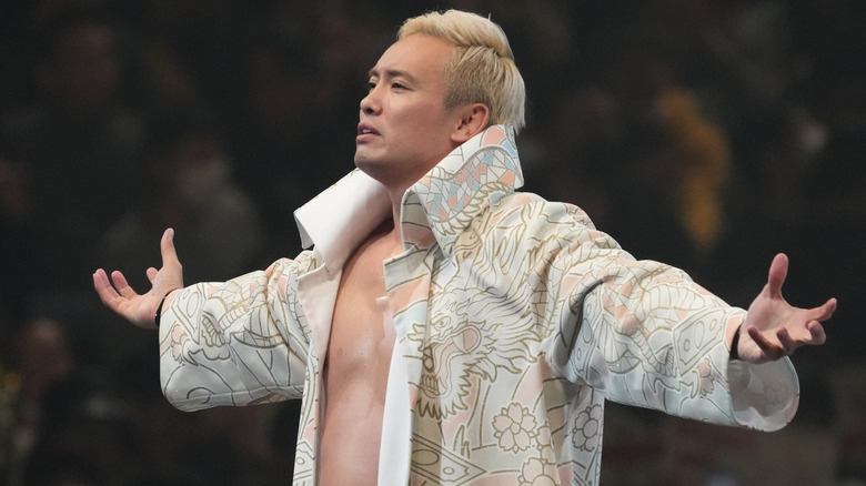 Okada posing