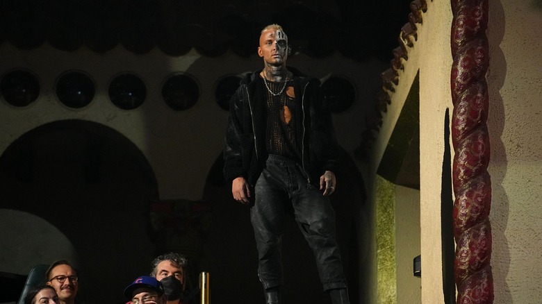 Darby Allin stands on the balcony of the Aragon Ballroom