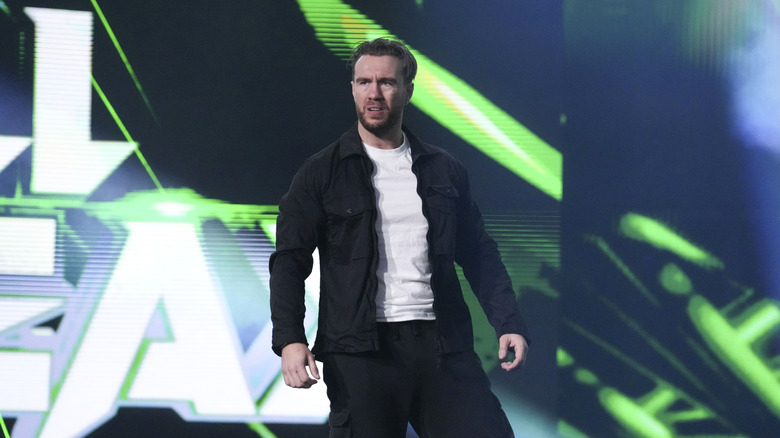 Will Ospreay makes his return to AEW and is seen standing on the stage at Revolution.