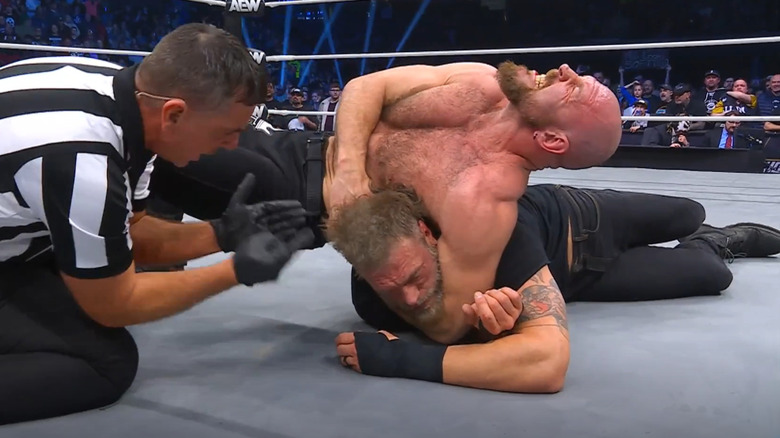 Jon Moxley chokes out Cope