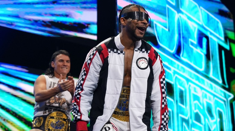 Kevin Knight makes his entrance flanked by Mike Bailey