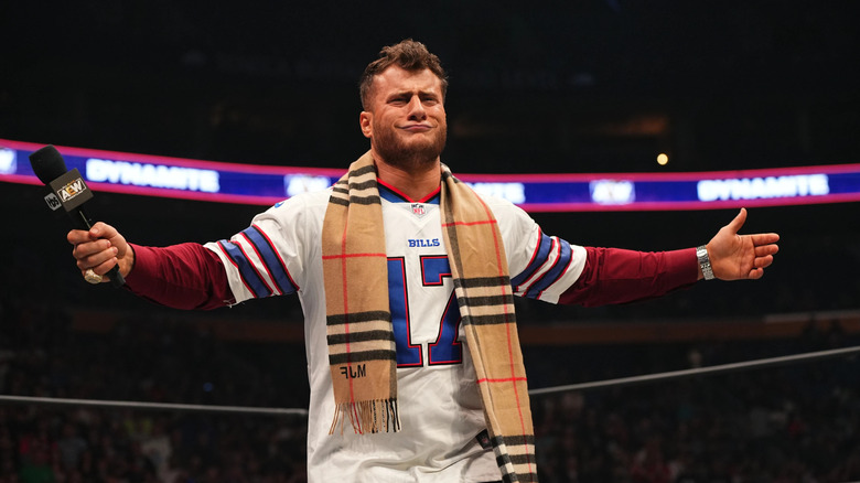 MJF does big arms in a Bills jersey