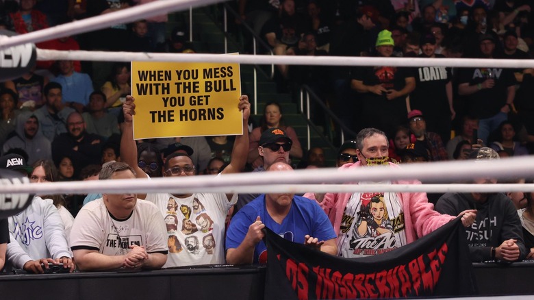 A fan shows off his Rush sign