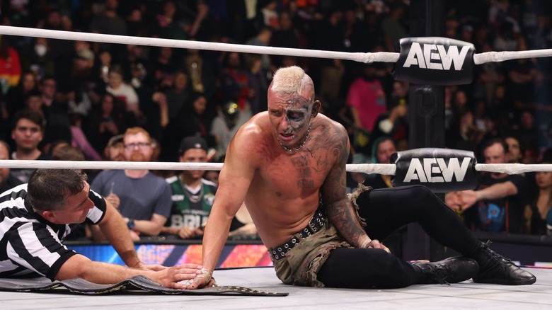 Darby Allin celebrates with the AEW World Title