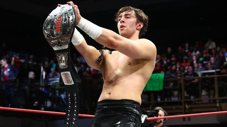 Nick Wayne holds up ROH World TV title on "AEW Collision."