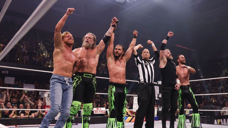 Orange Cassidy, Adam Copeland, Matt Jackson, Christian Cage, and Nick Jackson celebrate