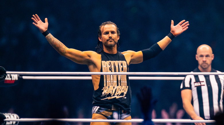 Adam Cole poses