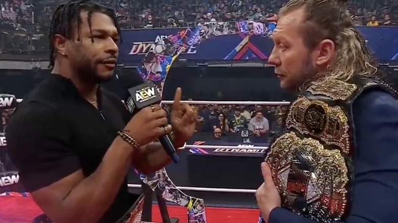 Knight and Omega inside the ring during their verbal confrontation