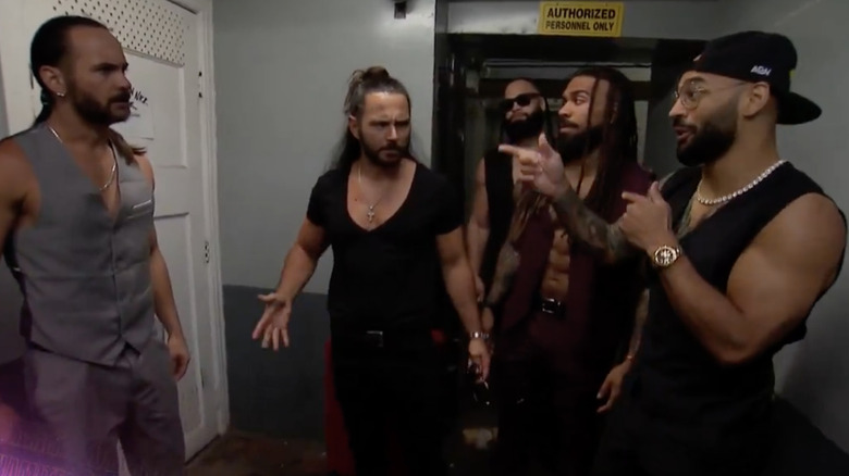 Ricochet and The Gates Of Agony mocking The Bucks outside their old dressing room