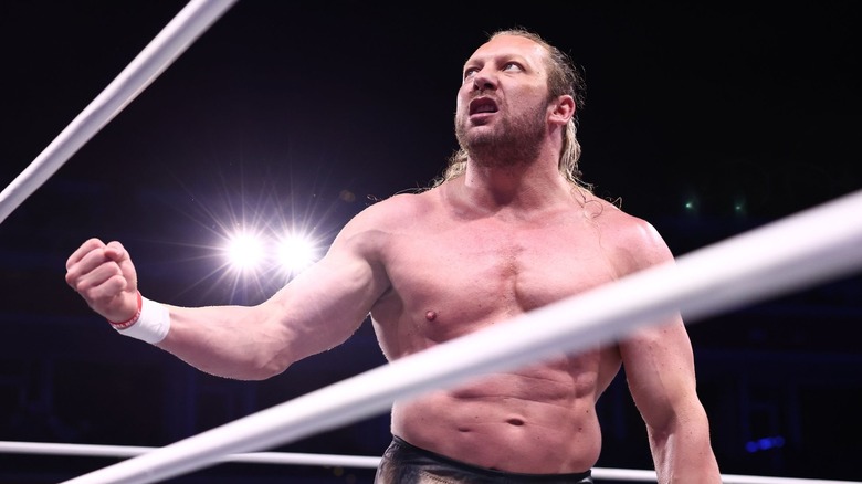 Kenny Omega makes a fist