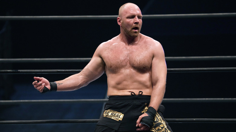 Jon Moxley leans on the ropes