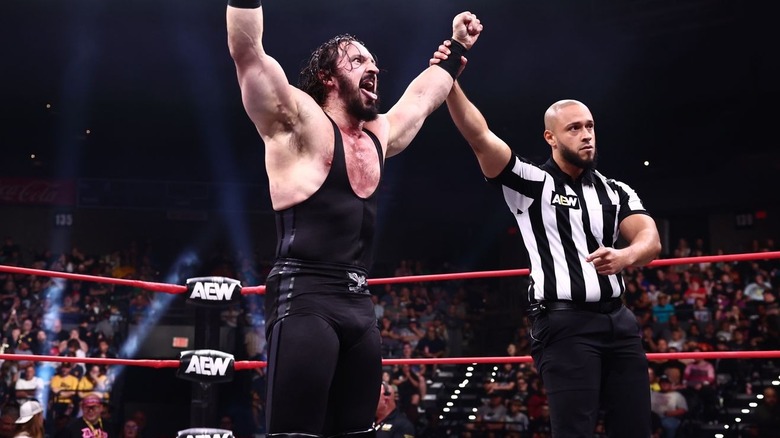 PAC getting his arm raised by the referee on 