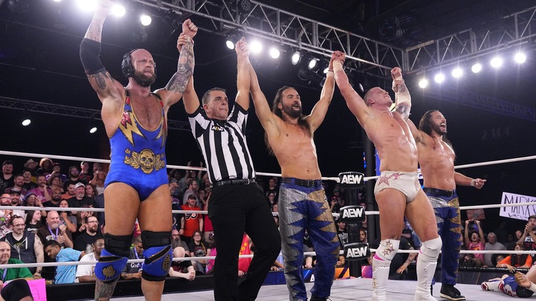 The Young Bucks celebrate with Josh Alexander & Kyle Fletcher