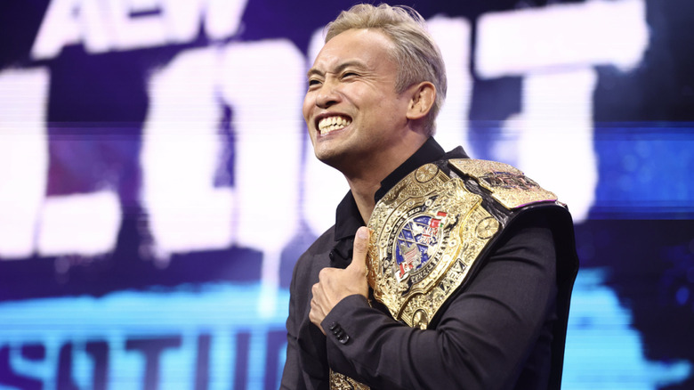 Okada smiling on the entrance ramp with his International Championship