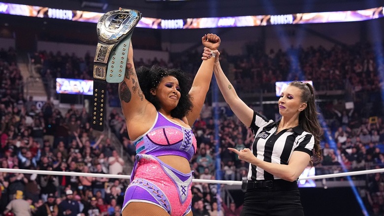 Willow Nightingale celebrates with the TBS Title