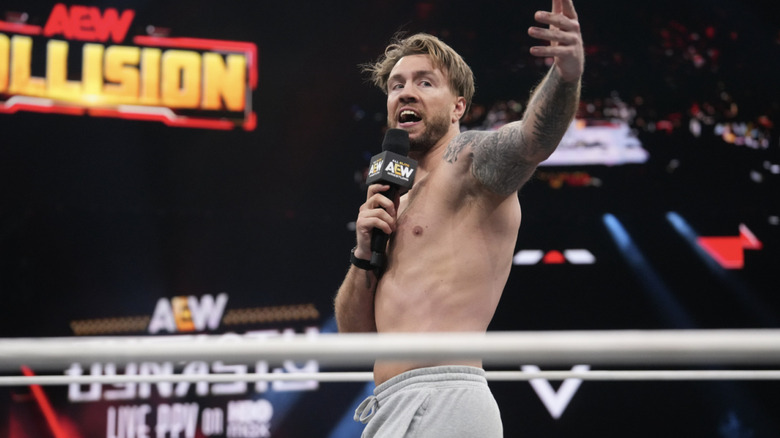 Ospreay talking in the ring