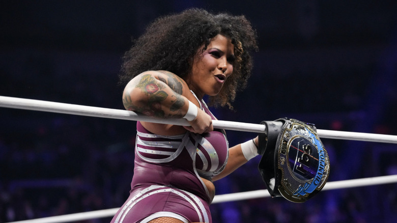 Nightingale in the ring with her TBS Championship belt